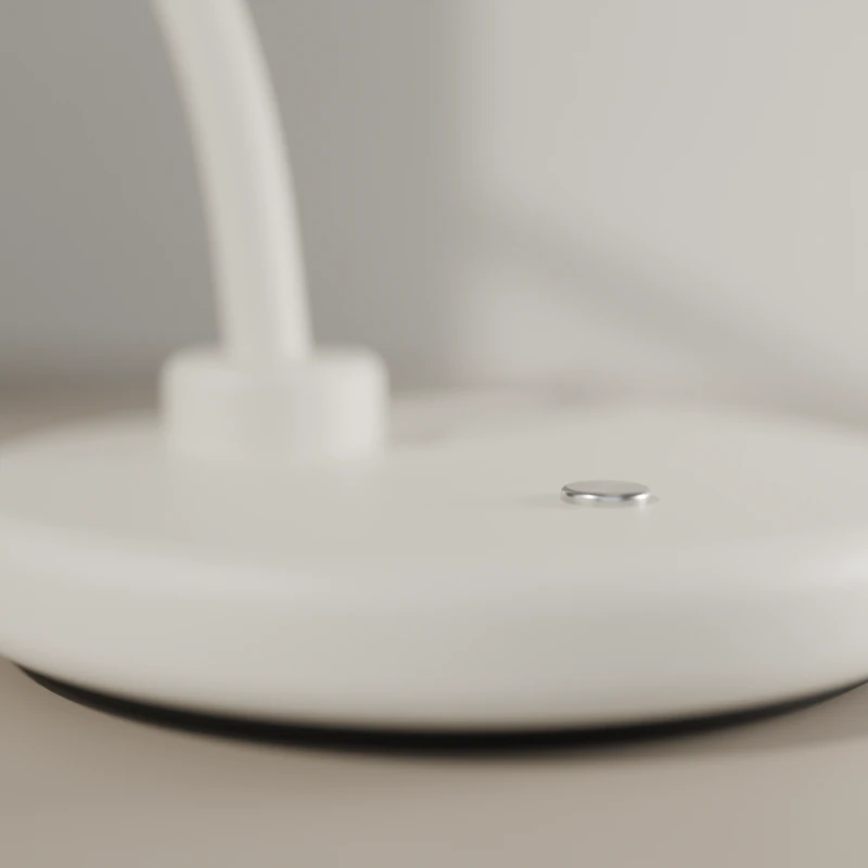 The weighted chalk base with its flush nickel dimmer button and the stem socket behind.